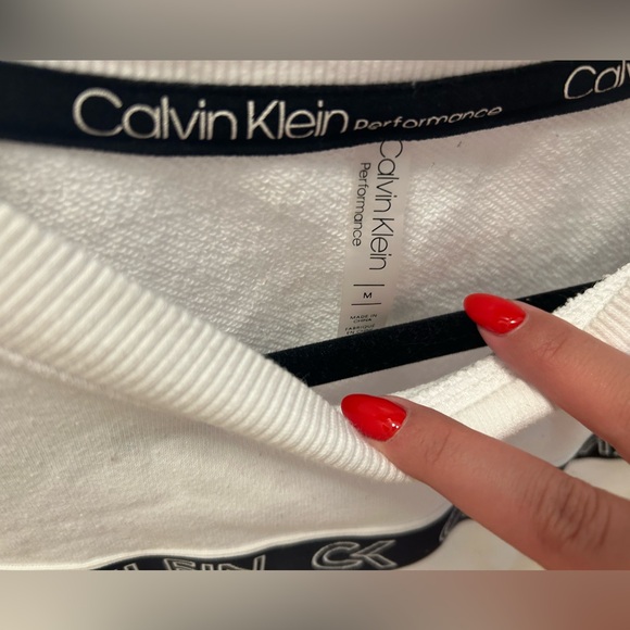 Calvin Klein, white and black crew neck, crop top (mid length). Size medium. - Picture 2 of 3